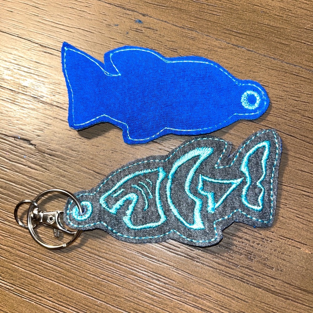 Embroidered keychain, shark theme. Made with repurposed fabrics. Made in USA